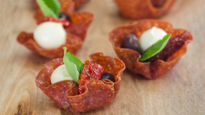 Image of salami cups filled with olives and bocconcini