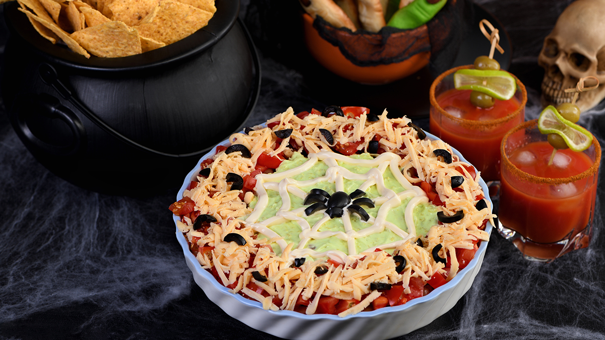 Image of halloween style dip surrounded by halloween decorations